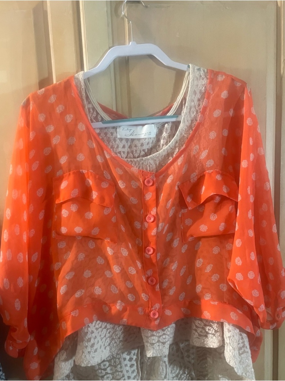 Beautiful Free People Sheer Mango Color Blouse.
